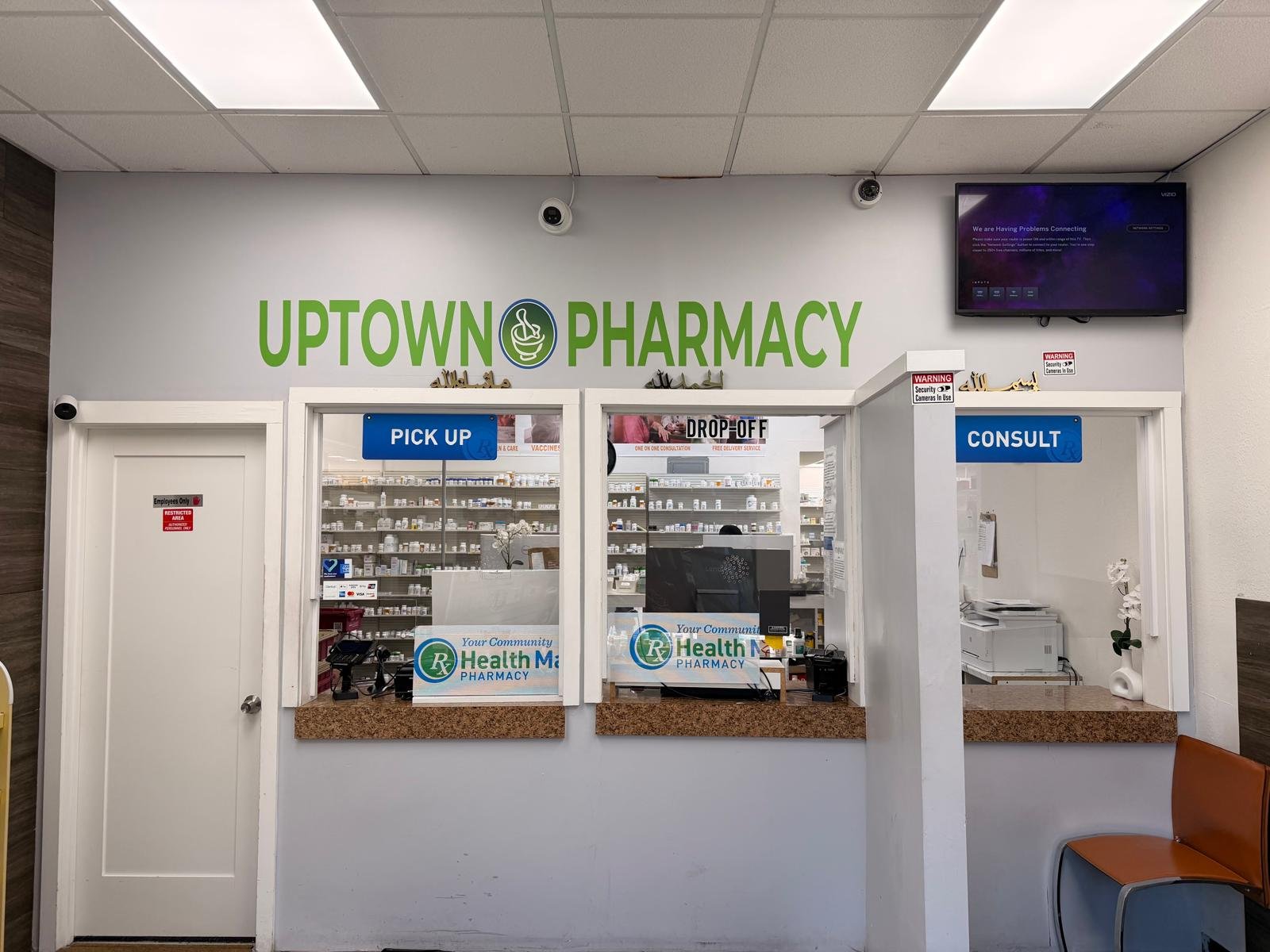 Inside Uptown Pharmacy — shelves stocked with health and wellness products