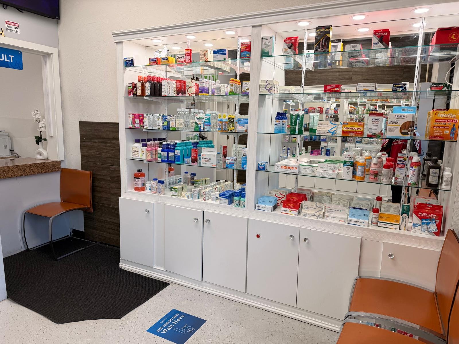 Inside Uptown Pharmacy — shelves stocked with health and wellness products